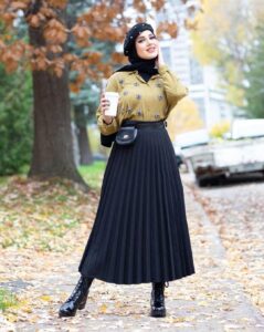 Chic Winter Outfits Featuring Pleated Skirts - Hijab Fashion Inspiration